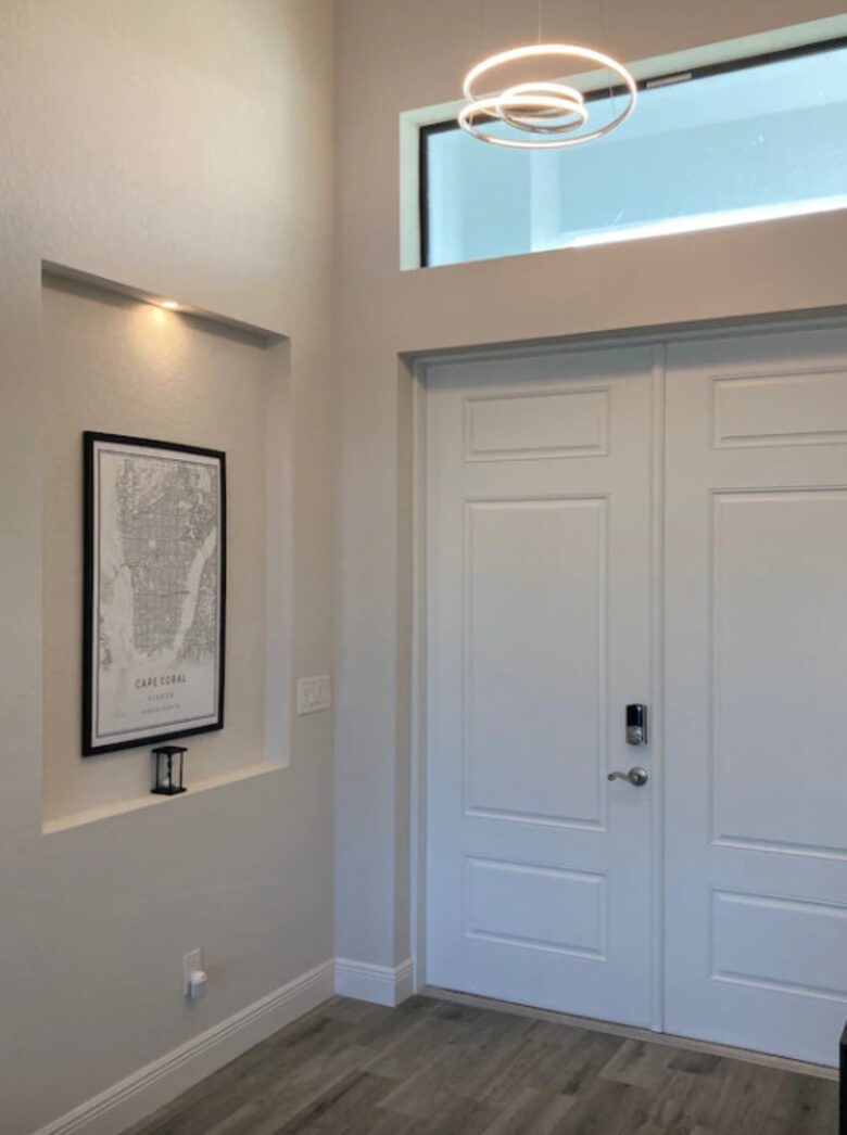 Home exchange in Cape Coral FL, entryway with decor & white doors