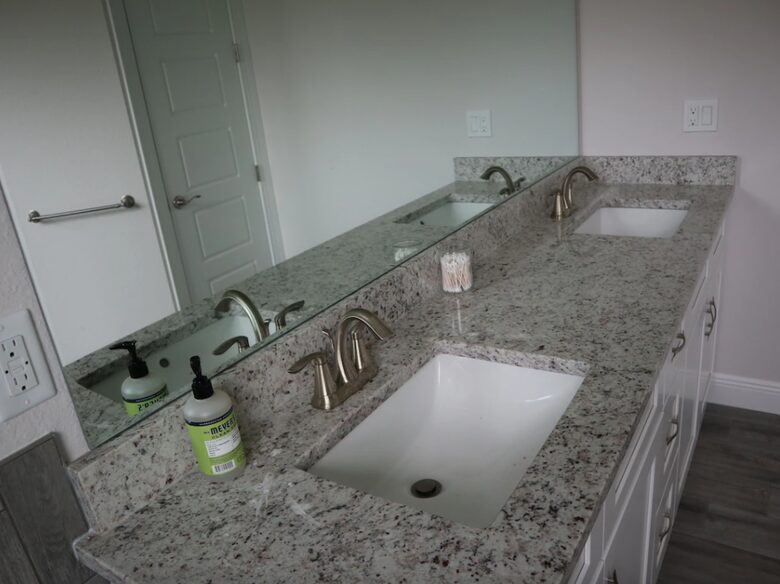 Home exchange in Cape Coral FL, master bath with dual granite vanity