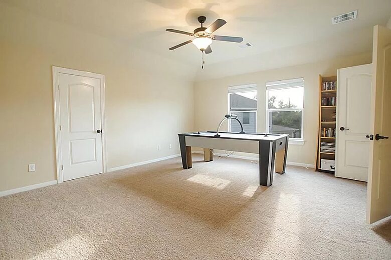 Home exchange in Woodlands TX, game room with air hockey table