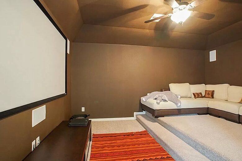 Home exchange in Woodlands TX, home theater room with projector