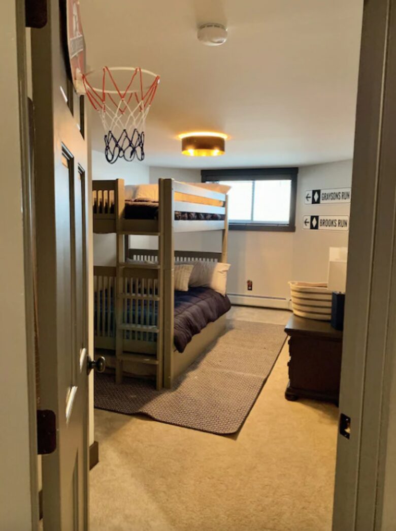 Home exchange in Jay Peak VT, lower level bedroom with one full bunk