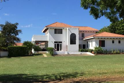 Home exchange at Gran Pacifica, exterior with large green lawn