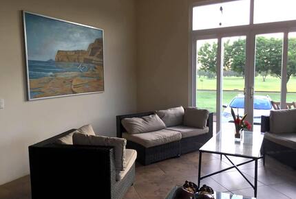 Home exchange at Gran Pacifica, living room with french doors
