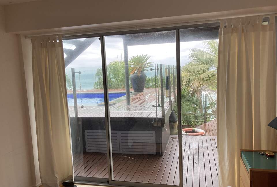 Home Exchange with second bedroom directly to pool and private deck