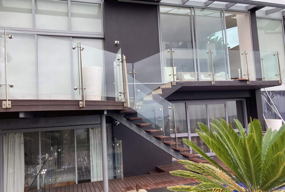 View of home exterior from simming pool deck