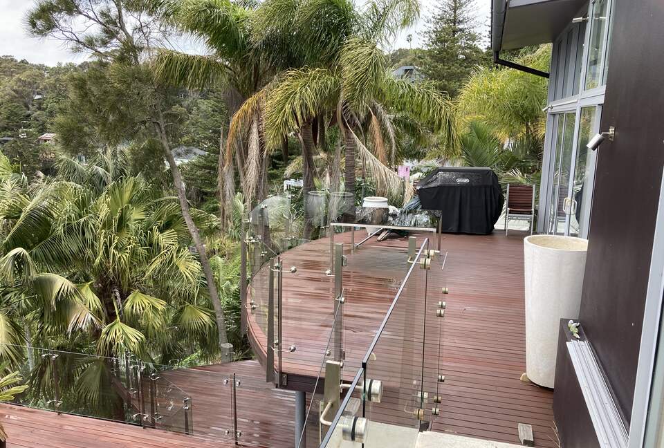 Spacious deck and dining area off dining & master bedroom