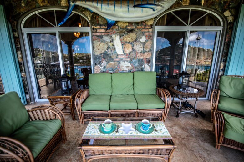 Home exchange in St John USVI, balcony with green seat cushions