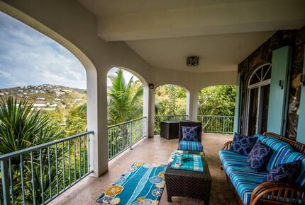 Home exchange in St John USVI, share balcony with soft seating