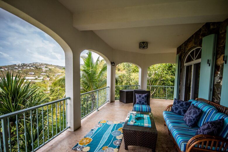 Home exchange in St John USVI, share balcony with soft seating