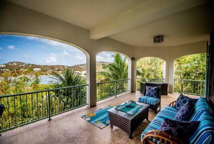 Home exchange in St John USVI, shared balcony overlooking the water