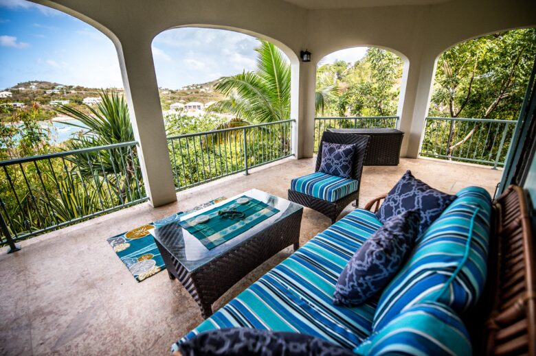 Home exchange in St John USVI, shared balcony with soft seating