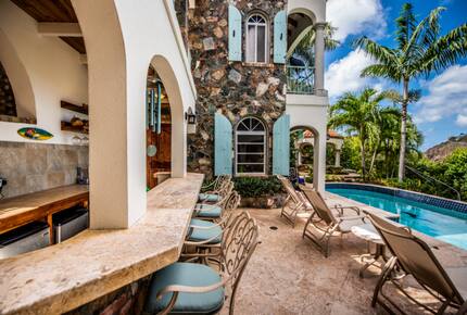 Home exchange in St John USVI, outdoor bar area overlooking the pool