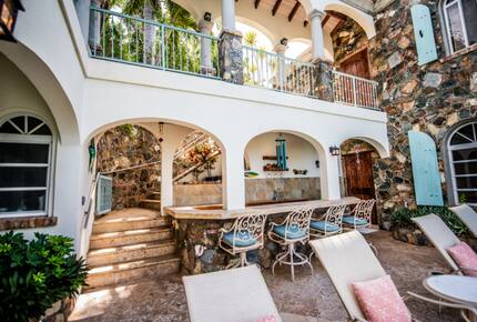 Home exchange in St John USVI, poolside lounge area with bar