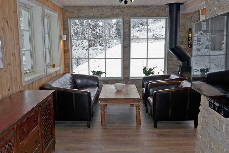 The main room with the fireplace