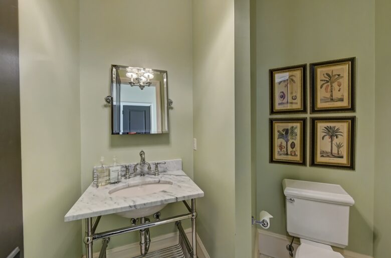 Home exchange in Charlotte NC, half bath with light green walls