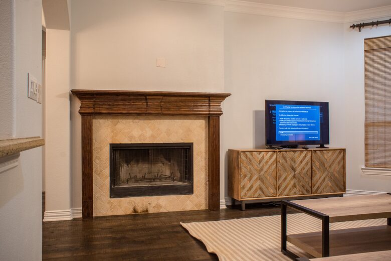 Home exchange in Farmers Branch TX, living room with fireplace