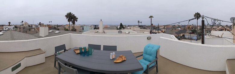 Home exchange in Oxnard CA, rooftop patio with dining table