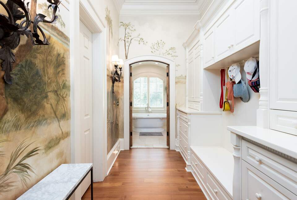 master closet leading to luxurious bath