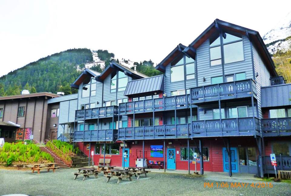 front of building with Alyeska in the background