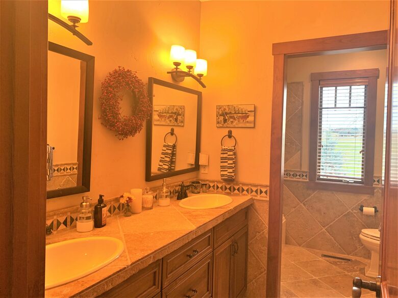 Home Exchange in Polson, Montana large guest bathroom double vanity