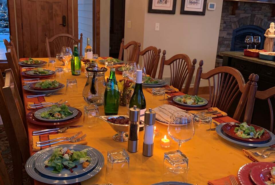 Home Exchange in Polson, Montana dining table set for a feast