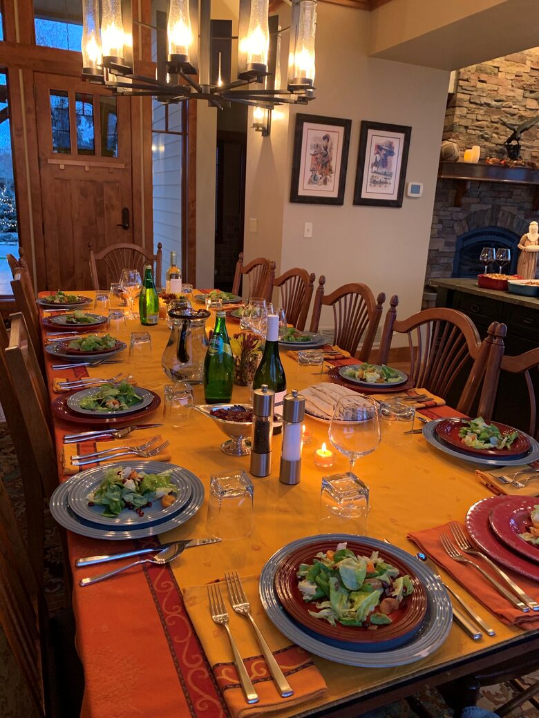Home Exchange in Polson, Montana dining table set for a feast