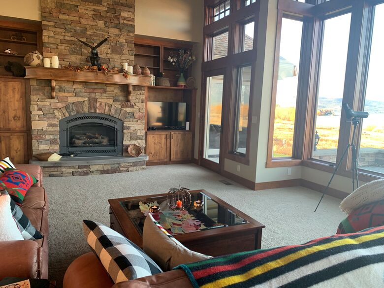 Home Exchange in Polson, Montana family room with cozy fireplace