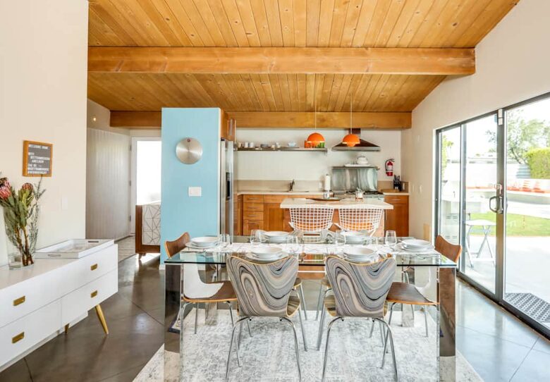 Home Exchange in Palm Springs, CA, stunning glass dining table