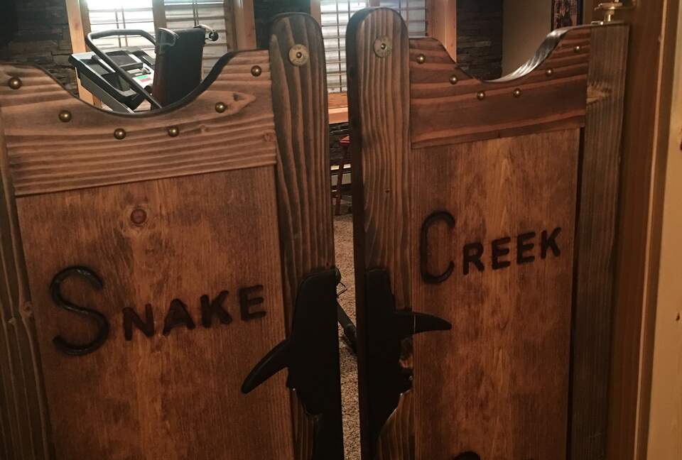 Saloon doors leading to exercise/ game room