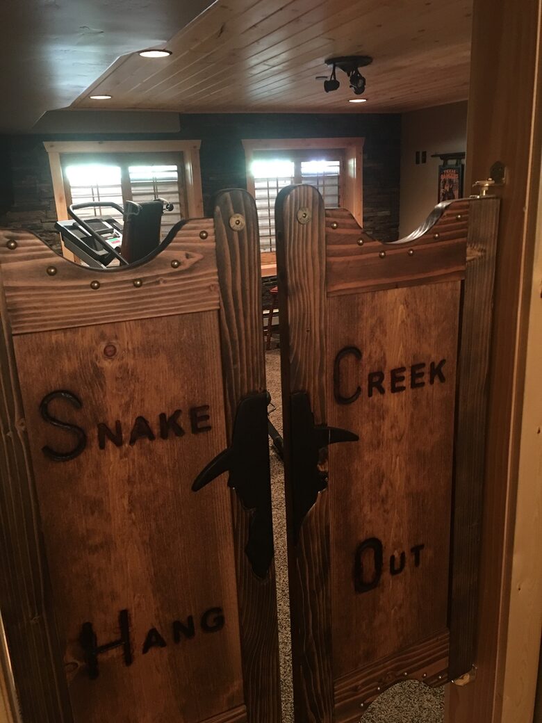 Saloon doors leading to exercise/ game room