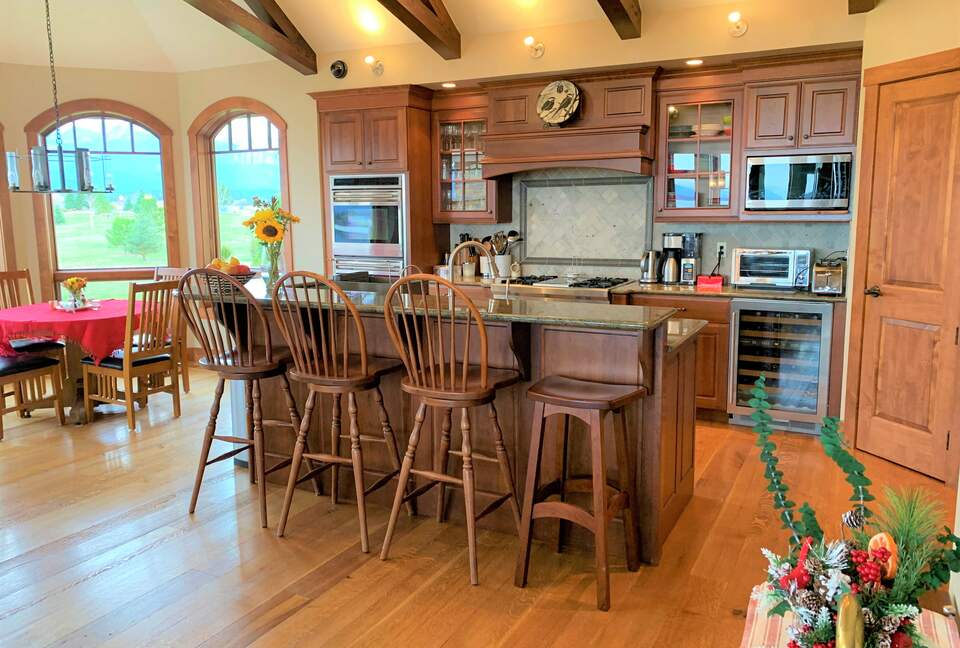 Home Exchange in Polson, Montana kitchen with bar seating