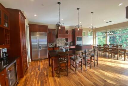 Home Exchange in British Columbia grand kitchen with wood floors