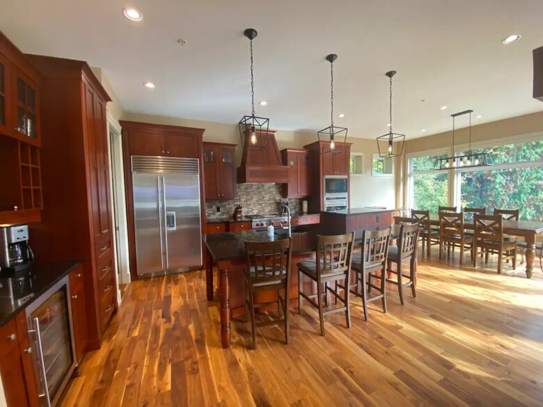 Home Exchange in British Columbia grand kitchen with wood floors