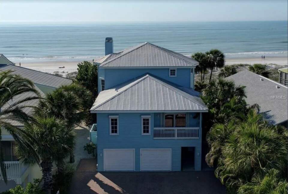 Home Exchange in Indian Shores, FL, beach blue home on ocean