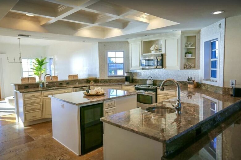 Home Exchange in Indian Shores, FL large granite countertop kitchen