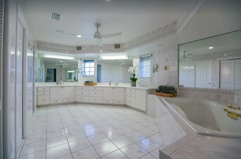 Home Exchange in Indian Shores, FL master bathroom en suite