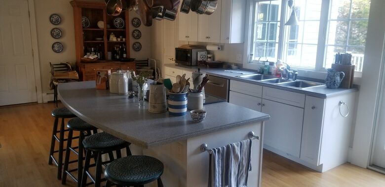 Home Exchange in Jamestown, RI, coastal kitchen with breakfast bar
