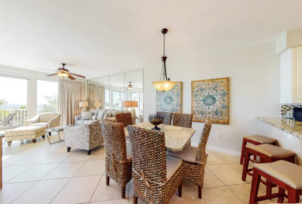 Home Exchange in Miramar Beach, FL, dining table and bar seating