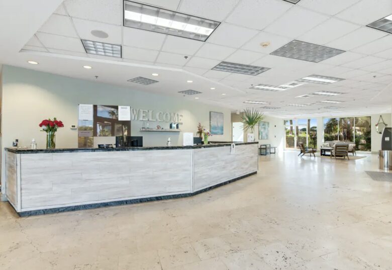 Home Exchange in Miramar Beach, FL, building front desk