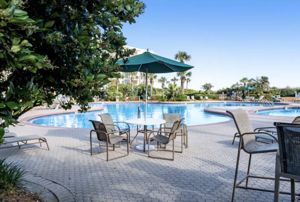 Home Exchange in Miramar Beach, FL, resort style pool with lounge