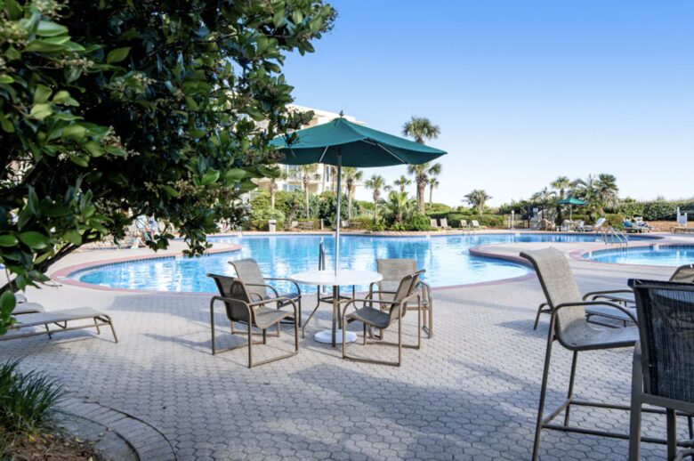 Home Exchange in Miramar Beach, FL, resort style pool with lounge