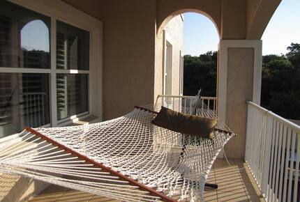 Home Exchange in Fernandina Beach, FL, private balcony with hammock