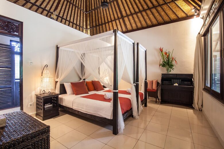 Home exchange in Ubud, Bali, second bedroom with canopy bed and desk