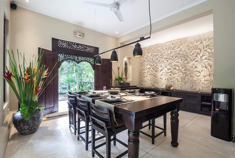 Home exchange in Ubud, Bali, dining table that doubles as pool table