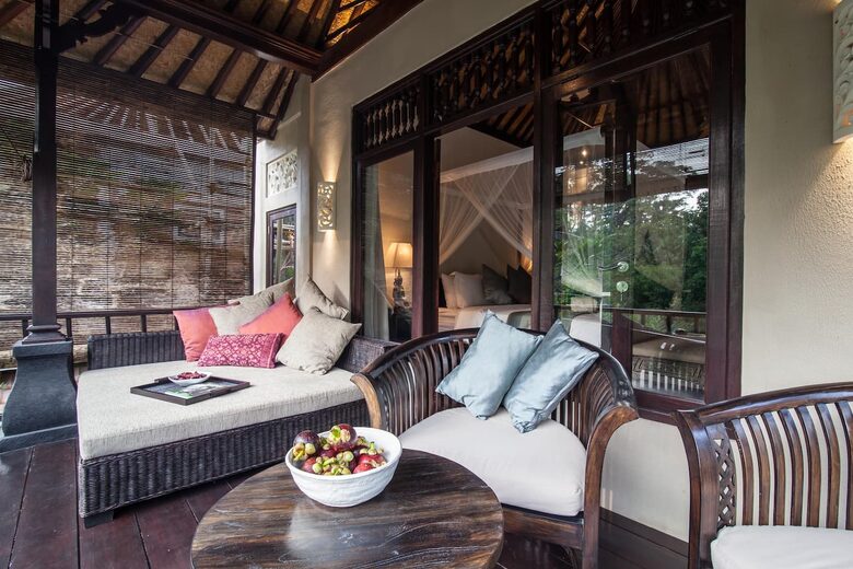 Home exchange in Ubud, Bali, master bedroom balcony with soft seating