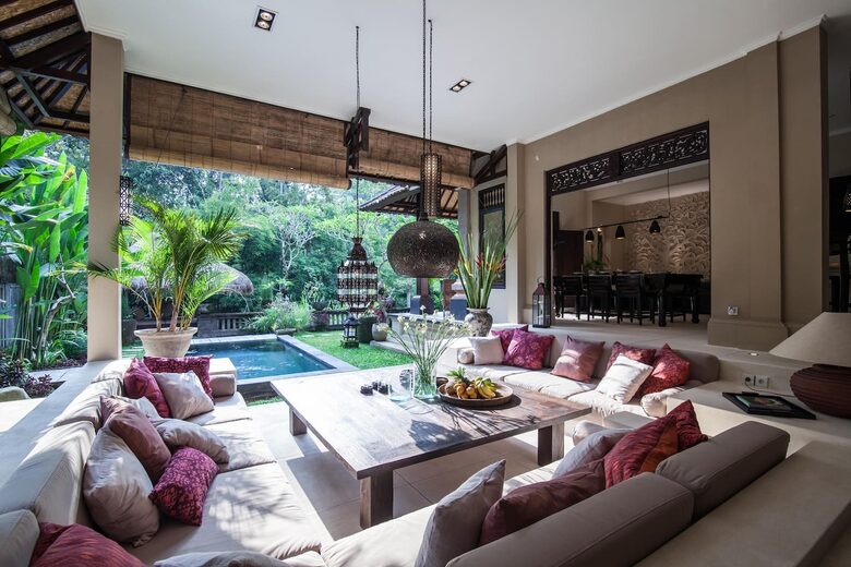 Home exchange in Ubud, Bali, large seating area open to garden & pool