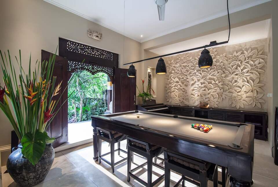 Home exchange in Ubud, Bali, pool table with views to the garden