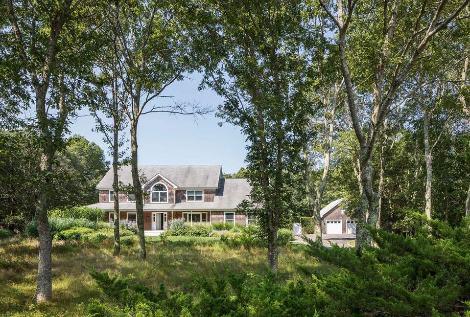 Home Exchange in Sag Harbor, NY, storybook home hidden in the trees