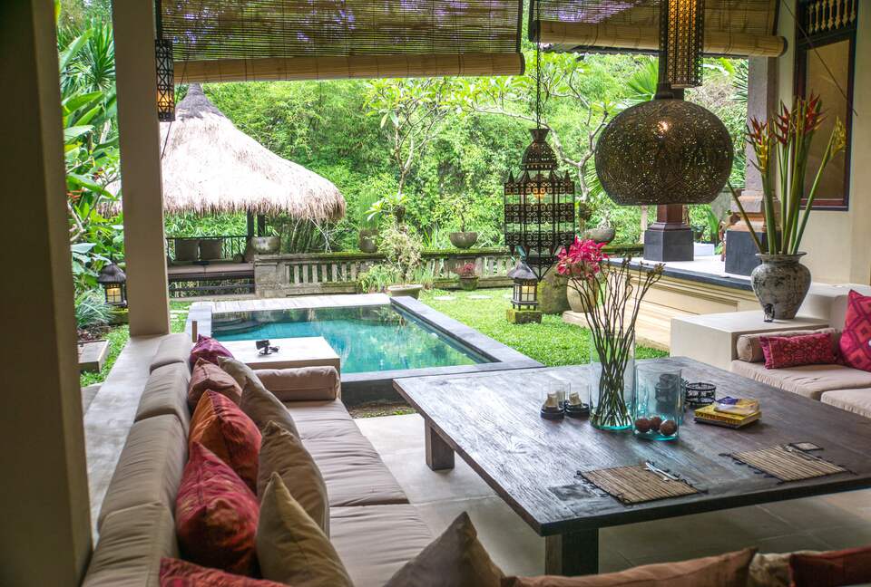 Home exchange in Ubud, Bali, sitting area open to pool and garden