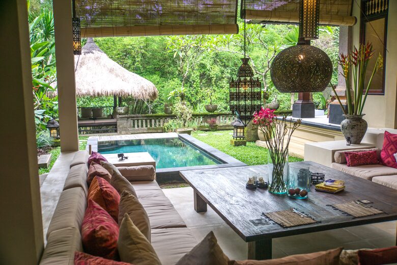Home exchange in Ubud, Bali, sitting area open to pool and garden